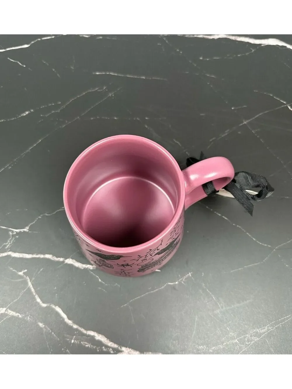 Connecting on Paper 2021 co. Crafted Ceramic Mug with Raven and Spellbook Design